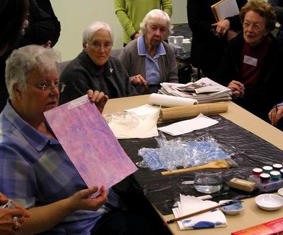 Adrienne Arvidson shows treated paper with two colours